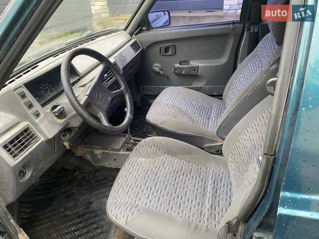 Зеленый ЗАЗ 1103 Славута, объемом двигателя 1.2 л и пробегом 320 тыс. км за 550 $, фото 4 на Automoto.ua