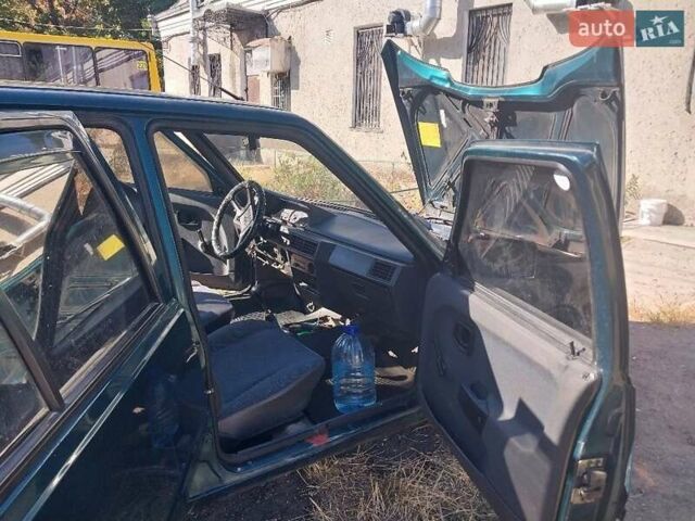 Зеленый ЗАЗ 1103 Славута, объемом двигателя 1.2 л и пробегом 100 тыс. км за 1000 $, фото 4 на Automoto.ua