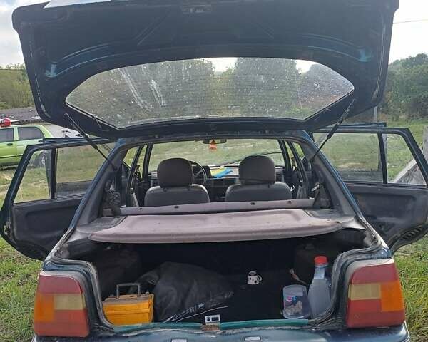 Зеленый ЗАЗ 1103 Славута, объемом двигателя 1.2 л и пробегом 300 тыс. км за 600 $, фото 2 на Automoto.ua