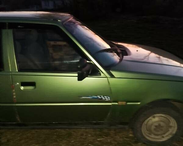 Зеленый ЗАЗ 1103 Славута, объемом двигателя 1.2 л и пробегом 250 тыс. км за 900 $, фото 4 на Automoto.ua