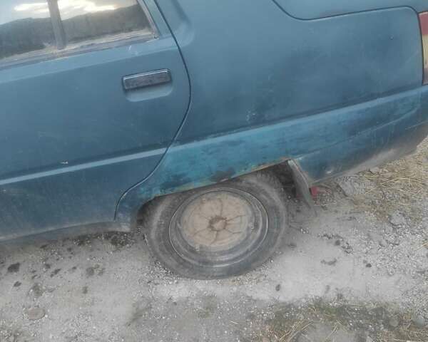 Зеленый ЗАЗ 1103 Славута, объемом двигателя 1.2 л и пробегом 220 тыс. км за 900 $, фото 3 на Automoto.ua