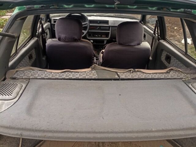 Зеленый ЗАЗ 1103 Славута, объемом двигателя 1.2 л и пробегом 130 тыс. км за 900 $, фото 1 на Automoto.ua