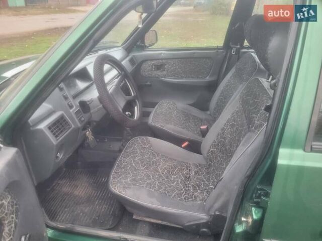 Зеленый ЗАЗ 1103 Славута, объемом двигателя 1.2 л и пробегом 194 тыс. км за 850 $, фото 2 на Automoto.ua