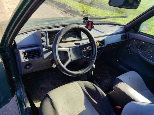 Зеленый ЗАЗ 1103 Славута, объемом двигателя 1.2 л и пробегом 170 тыс. км за 1300 $, фото 11 на Automoto.ua