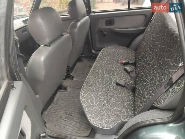 Зеленый ЗАЗ 1103 Славута, объемом двигателя 1.3 л и пробегом 140 тыс. км за 1100 $, фото 10 на Automoto.ua