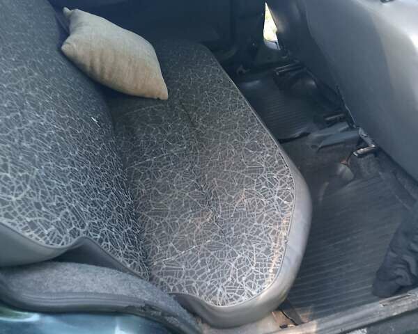 Зеленый ЗАЗ 1103 Славута, объемом двигателя 1.2 л и пробегом 260 тыс. км за 1200 $, фото 9 на Automoto.ua