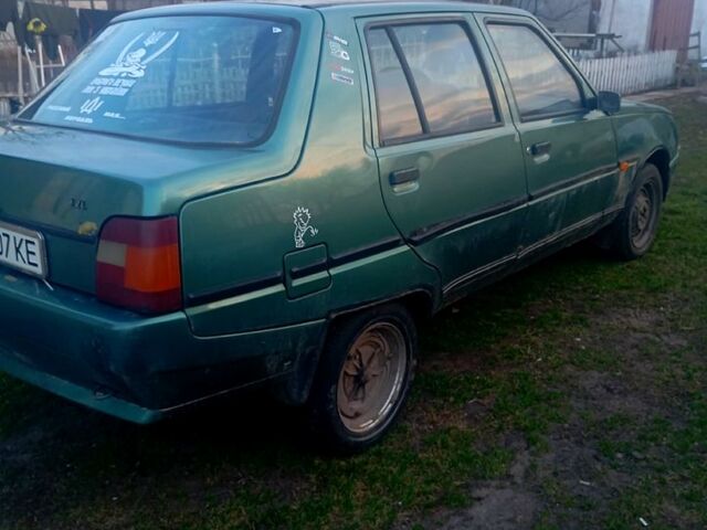 Зеленый ЗАЗ 1103 Славута, объемом двигателя 1.2 л и пробегом 230 тыс. км за 550 $, фото 2 на Automoto.ua