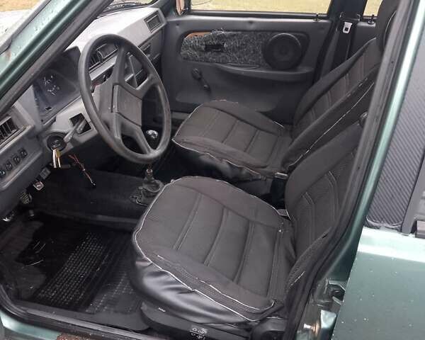 Зеленый ЗАЗ 1103 Славута, объемом двигателя 1.2 л и пробегом 230 тыс. км за 717 $, фото 6 на Automoto.ua