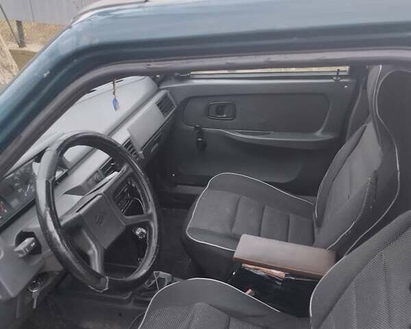 Зеленый ЗАЗ 1103 Славута, объемом двигателя 1.2 л и пробегом 200 тыс. км за 1100 $, фото 6 на Automoto.ua