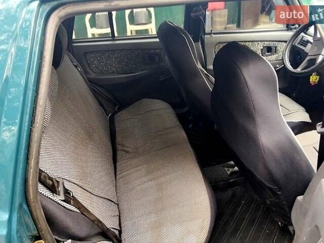 Зеленый ЗАЗ 1103 Славута, объемом двигателя 1.2 л и пробегом 110 тыс. км за 1000 $, фото 1 на Automoto.ua