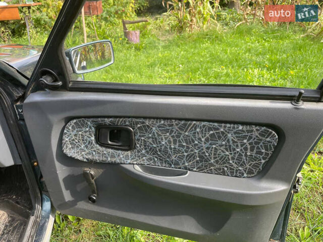 Зелений ЗАЗ 1103 Славута, об'ємом двигуна 1.2 л та пробігом 150 тис. км за 1100 $, фото 14 на Automoto.ua