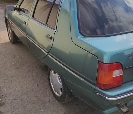 Зеленый ЗАЗ 1103 Славута, объемом двигателя 1.2 л и пробегом 63 тыс. км за 2100 $, фото 5 на Automoto.ua