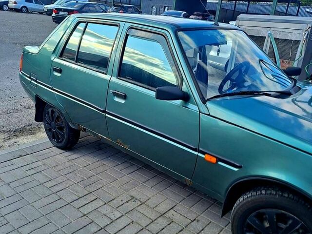 Зеленый ЗАЗ 1103 Славута, объемом двигателя 1.2 л и пробегом 170 тыс. км за 700 $, фото 3 на Automoto.ua