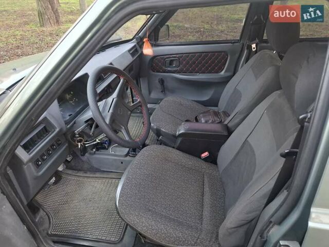 Зеленый ЗАЗ 1103 Славута, объемом двигателя 1.2 л и пробегом 145 тыс. км за 940 $, фото 2 на Automoto.ua