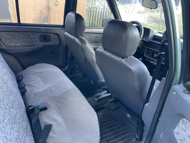 Зелений ЗАЗ 1103 Славута, об'ємом двигуна 1.2 л та пробігом 250 тис. км за 740 $, фото 11 на Automoto.ua