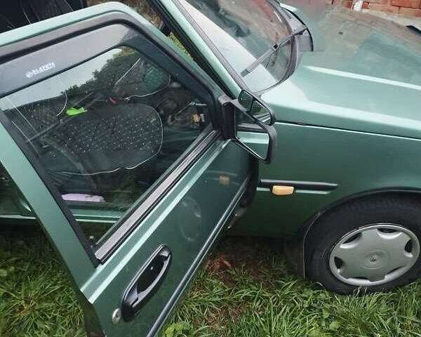 Зеленый ЗАЗ 1103 Славута, объемом двигателя 1.2 л и пробегом 126 тыс. км за 1250 $, фото 14 на Automoto.ua