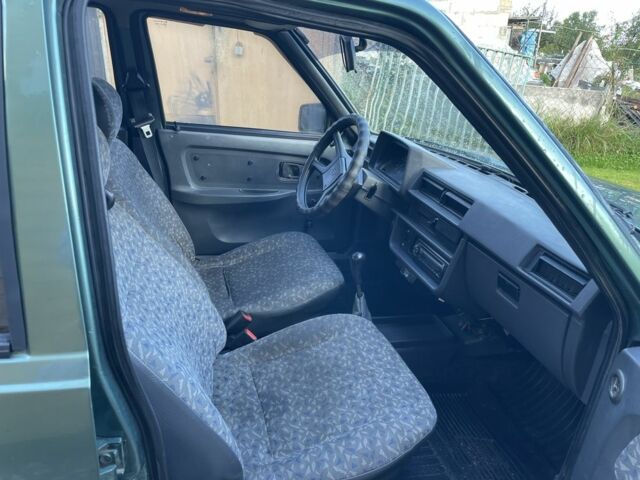 Зелений ЗАЗ 1103 Славута, об'ємом двигуна 1.2 л та пробігом 250 тис. км за 740 $, фото 12 на Automoto.ua