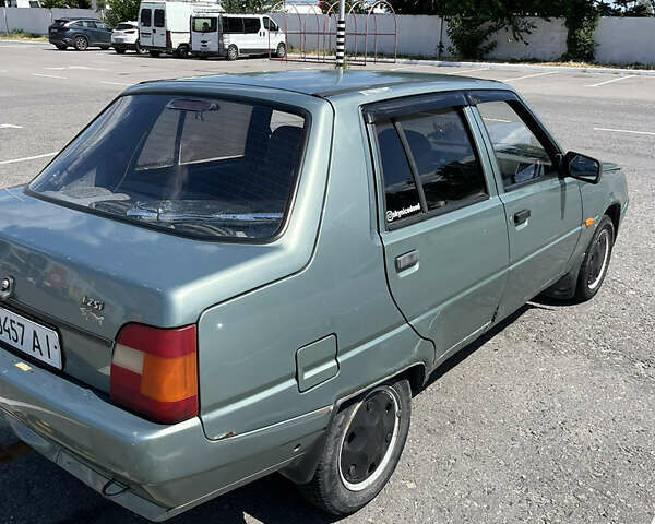 Зелений ЗАЗ 1103 Славута, об'ємом двигуна 1.2 л та пробігом 150 тис. км за 1100 $, фото 3 на Automoto.ua
