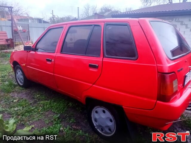 Красный ЗАЗ 1105 Дана, объемом двигателя 1.2 л и пробегом 200 тыс. км за 600 $, фото 3 на Automoto.ua