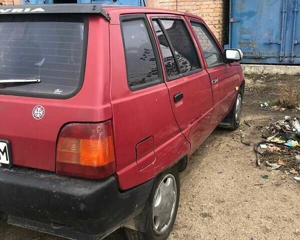 Красный ЗАЗ 1105 Дана, объемом двигателя 1.1 л и пробегом 160 тыс. км за 900 $, фото 5 на Automoto.ua