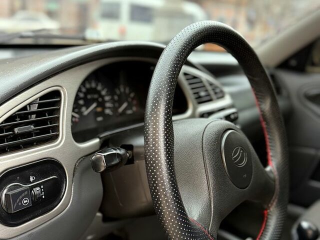 Черный ЗАЗ Ланос, объемом двигателя 1.6 л и пробегом 190 тыс. км за 2650 $, фото 7 на Automoto.ua