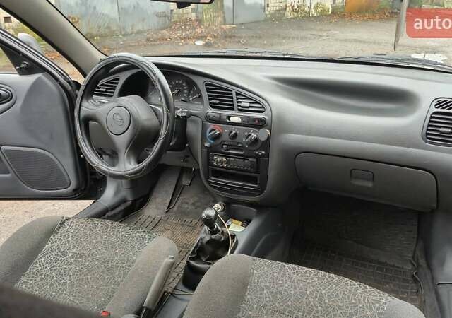 Черный ЗАЗ Ланос, объемом двигателя 1.5 л и пробегом 157 тыс. км за 3000 $, фото 5 на Automoto.ua