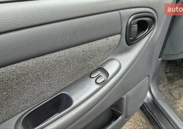 Черный ЗАЗ Ланос, объемом двигателя 1.5 л и пробегом 157 тыс. км за 3000 $, фото 1 на Automoto.ua