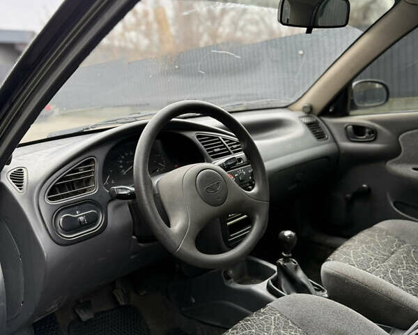 Чорний ЗАЗ Ланос, об'ємом двигуна 1.4 л та пробігом 82 тис. км за 2199 $, фото 6 на Automoto.ua