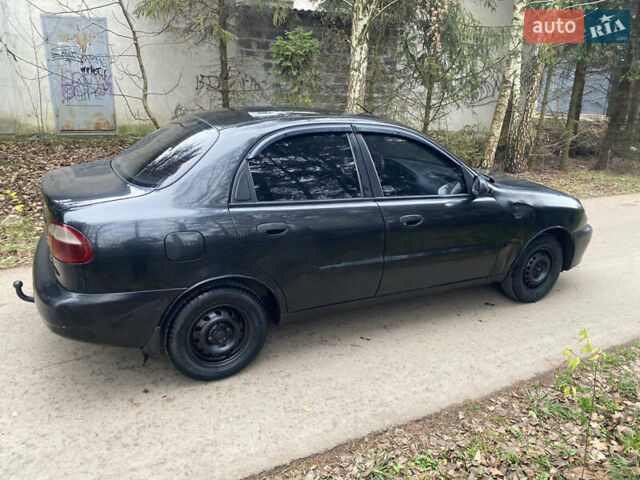 Чорний ЗАЗ Ланос, об'ємом двигуна 1.4 л та пробігом 325 тис. км за 1200 $, фото 1 на Automoto.ua