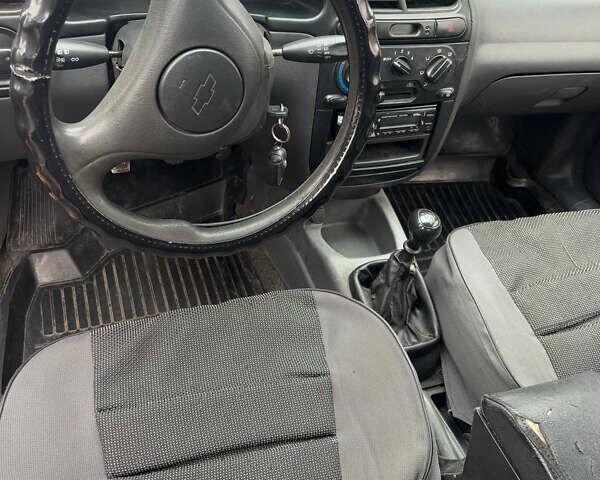 Черный ЗАЗ Ланос, объемом двигателя 1.4 л и пробегом 280 тыс. км за 850 $, фото 2 на Automoto.ua