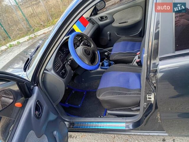 Черный ЗАЗ Ланос, объемом двигателя 1.39 л и пробегом 195 тыс. км за 2000 $, фото 5 на Automoto.ua