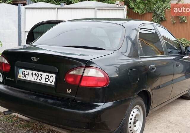 Черный ЗАЗ Ланос, объемом двигателя 1.39 л и пробегом 242 тыс. км за 2500 $, фото 2 на Automoto.ua