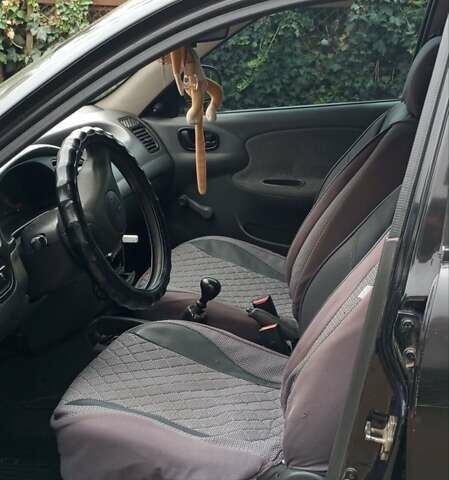 Черный ЗАЗ Ланос, объемом двигателя 1.39 л и пробегом 242 тыс. км за 2500 $, фото 3 на Automoto.ua