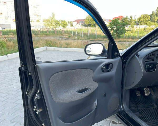 Чорний ЗАЗ Ланос, об'ємом двигуна 1.39 л та пробігом 219 тис. км за 2700 $, фото 14 на Automoto.ua