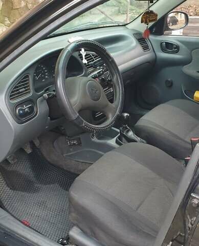 Чорний ЗАЗ Ланос, об'ємом двигуна 1.39 л та пробігом 181 тис. км за 1500 $, фото 13 на Automoto.ua