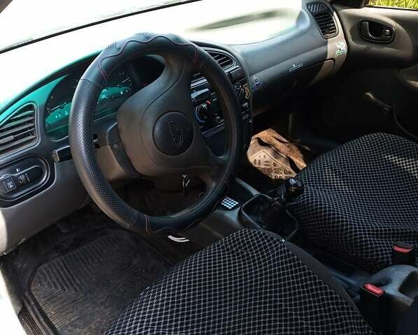 Черный ЗАЗ Ланос, объемом двигателя 1.4 л и пробегом 260 тыс. км за 1800 $, фото 4 на Automoto.ua