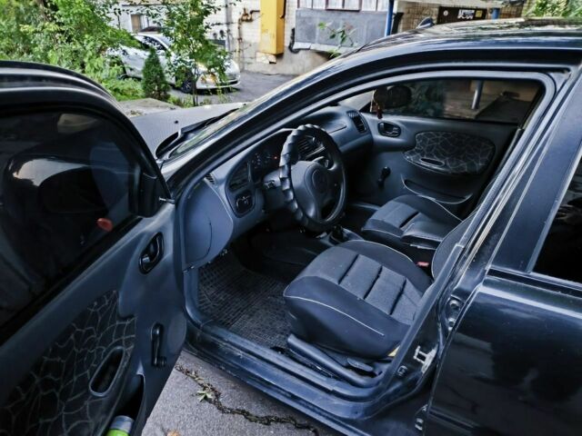 Чорний ЗАЗ Ланос, об'ємом двигуна 1.3 л та пробігом 322 тис. км за 2000 $, фото 7 на Automoto.ua