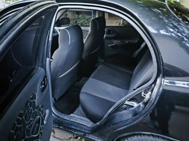 Чорний ЗАЗ Ланос, об'ємом двигуна 1.3 л та пробігом 322 тис. км за 2000 $, фото 8 на Automoto.ua