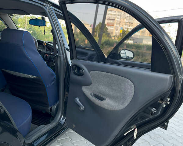 Чорний ЗАЗ Ланос, об'ємом двигуна 1.39 л та пробігом 219 тис. км за 2700 $, фото 16 на Automoto.ua