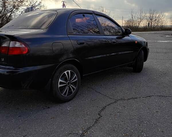 Черный ЗАЗ Ланос, объемом двигателя 1.39 л и пробегом 195 тыс. км за 2000 $, фото 2 на Automoto.ua