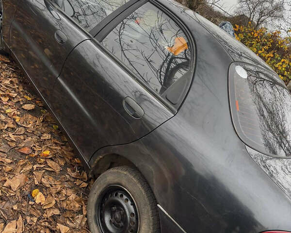 Черный ЗАЗ Ланос, объемом двигателя 1.4 л и пробегом 280 тыс. км за 850 $, фото 1 на Automoto.ua