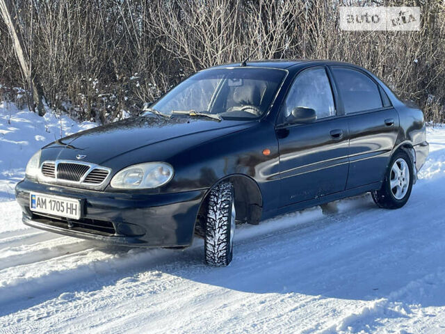 Чорний ЗАЗ Ланос, об'ємом двигуна 1.39 л та пробігом 138 тис. км за 1999 $, фото 3 на Automoto.ua