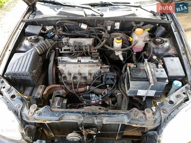 Черный ЗАЗ Ланос, объемом двигателя 1.4 л и пробегом 260 тыс. км за 1800 $, фото 7 на Automoto.ua