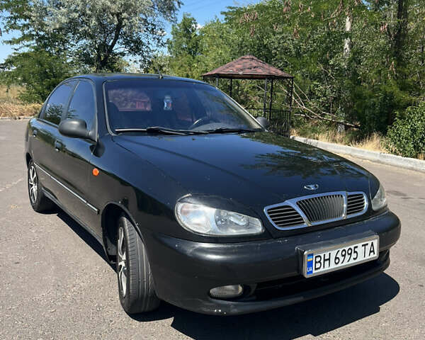 Черный ЗАЗ Ланос, объемом двигателя 1.4 л и пробегом 220 тыс. км за 1800 $, фото 3 на Automoto.ua