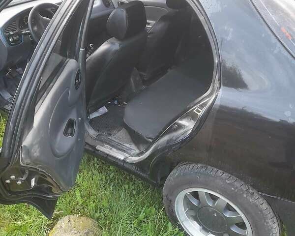 Черный ЗАЗ Ланос, объемом двигателя 1.5 л и пробегом 200 тыс. км за 1700 $, фото 2 на Automoto.ua