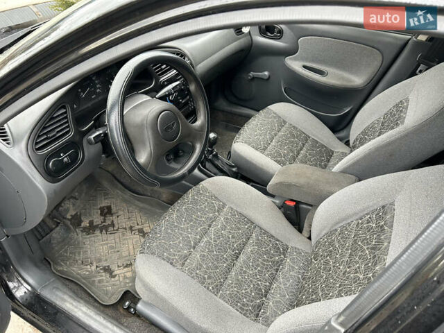 Черный ЗАЗ Ланос, объемом двигателя 1.39 л и пробегом 236 тыс. км за 1800 $, фото 9 на Automoto.ua