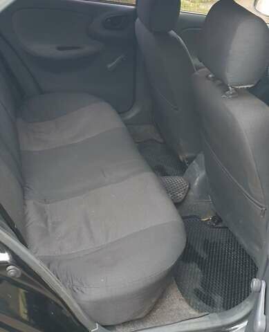 Чорний ЗАЗ Ланос, об'ємом двигуна 1.39 л та пробігом 181 тис. км за 1500 $, фото 4 на Automoto.ua