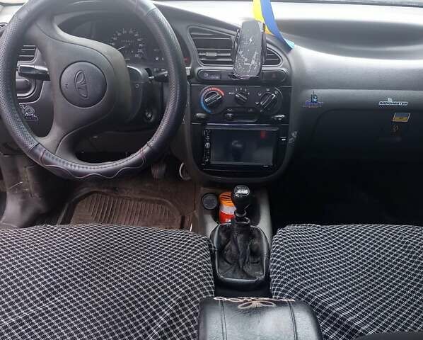 Черный ЗАЗ Ланос, объемом двигателя 1.4 л и пробегом 260 тыс. км за 1800 $, фото 13 на Automoto.ua