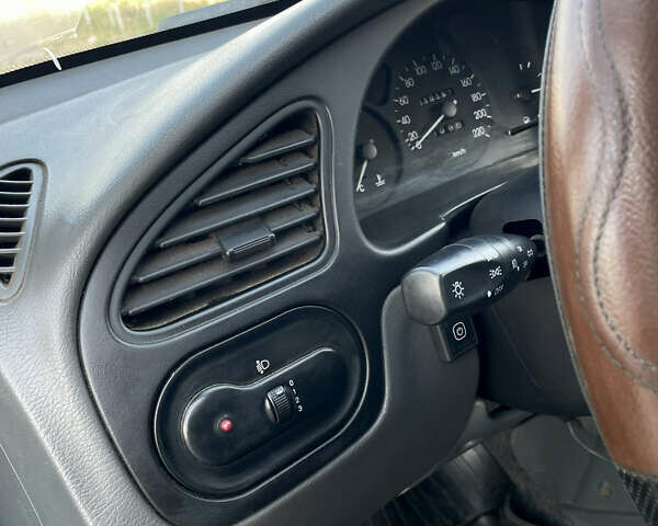 Чорний ЗАЗ Ланос, об'ємом двигуна 1.39 л та пробігом 219 тис. км за 2700 $, фото 7 на Automoto.ua