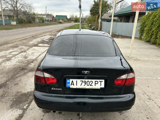 Черный ЗАЗ Ланос, объемом двигателя 1.39 л и пробегом 236 тыс. км за 1800 $, фото 4 на Automoto.ua